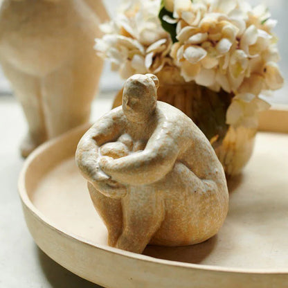 Vigan, Seated Woman Sculpture