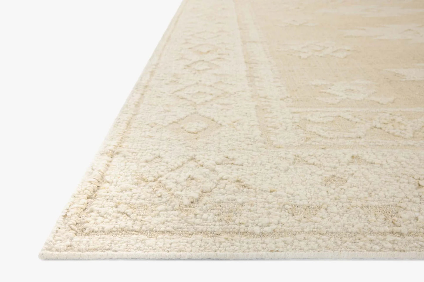 Alara Ivory/Natural jute and wool area rug in a soft neutral palette.