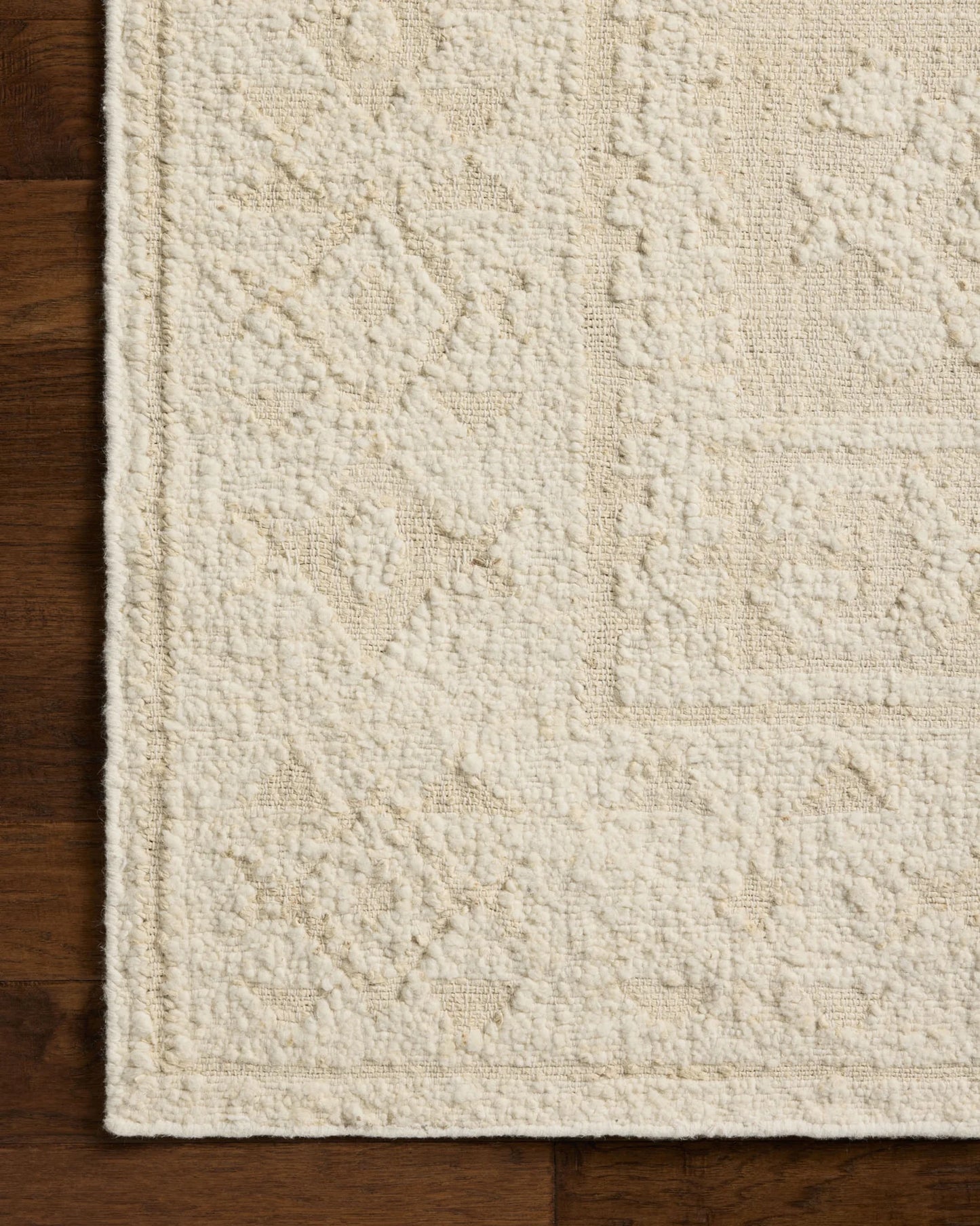 Alara Ivory/Natural area rug styled in a neutral room