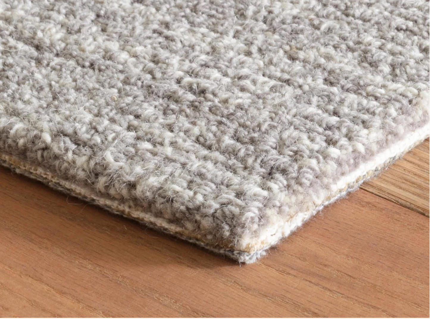 Close-up of the Annie Selke Crosshatched Dove Grey wool rug texture.