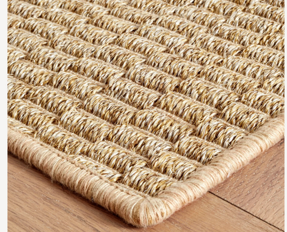 Close-up of the Annie Selke Wicker Natural sisal and jute rug texture.