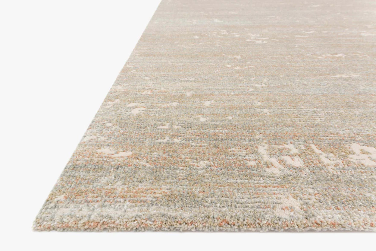 Close-up of the Augustus Sunset/Mist polypropylene and polyester rug texture.