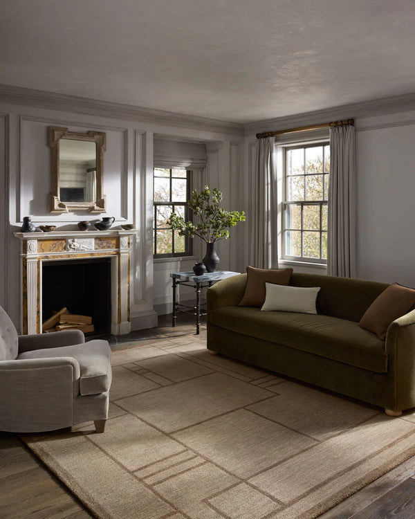 Barrow Beige/Taupe area rug styled in a refined living room