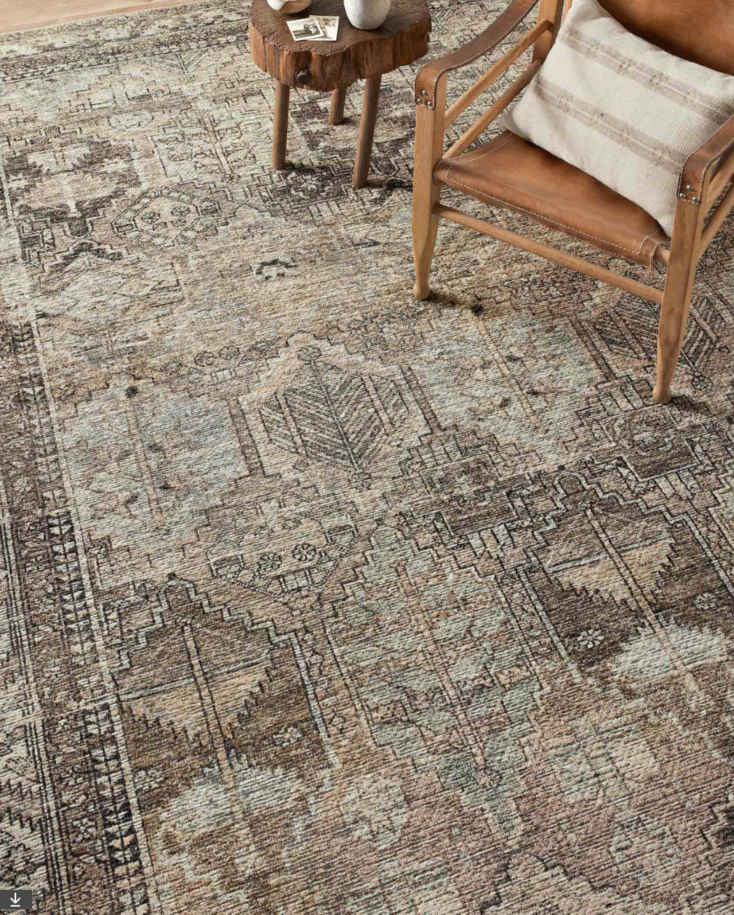 Close-up of the Billie Clay/Sage rug distressed texture.