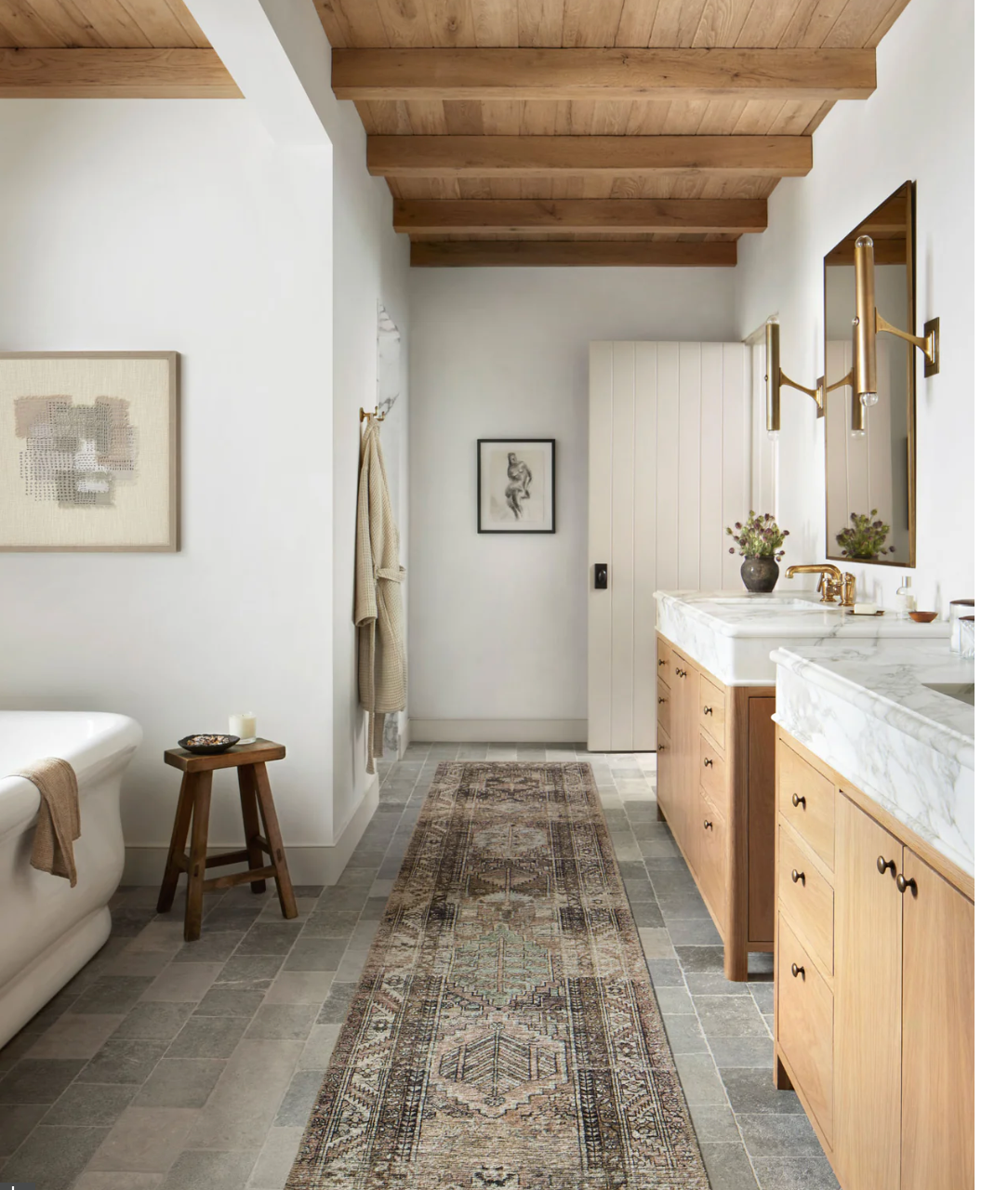 Billie Clay/Sage area rug runner styled in a bathroom
