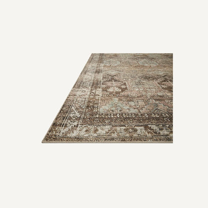 Side view of the Billie Clay/Sage rug distressed texture