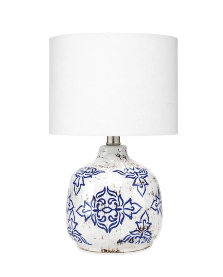 Antiqued blue-and-white ceramic accent lamp with a vintage floral pattern