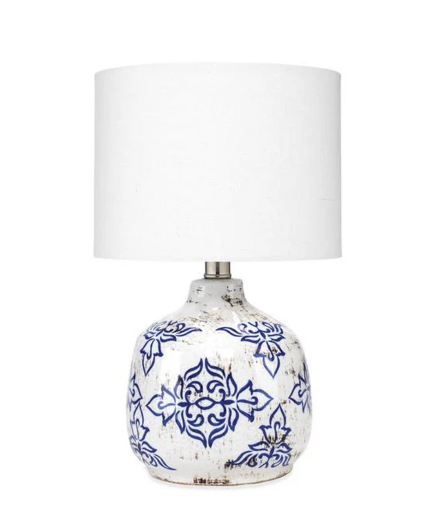 Antiqued blue-and-white ceramic accent lamp with a vintage floral pattern