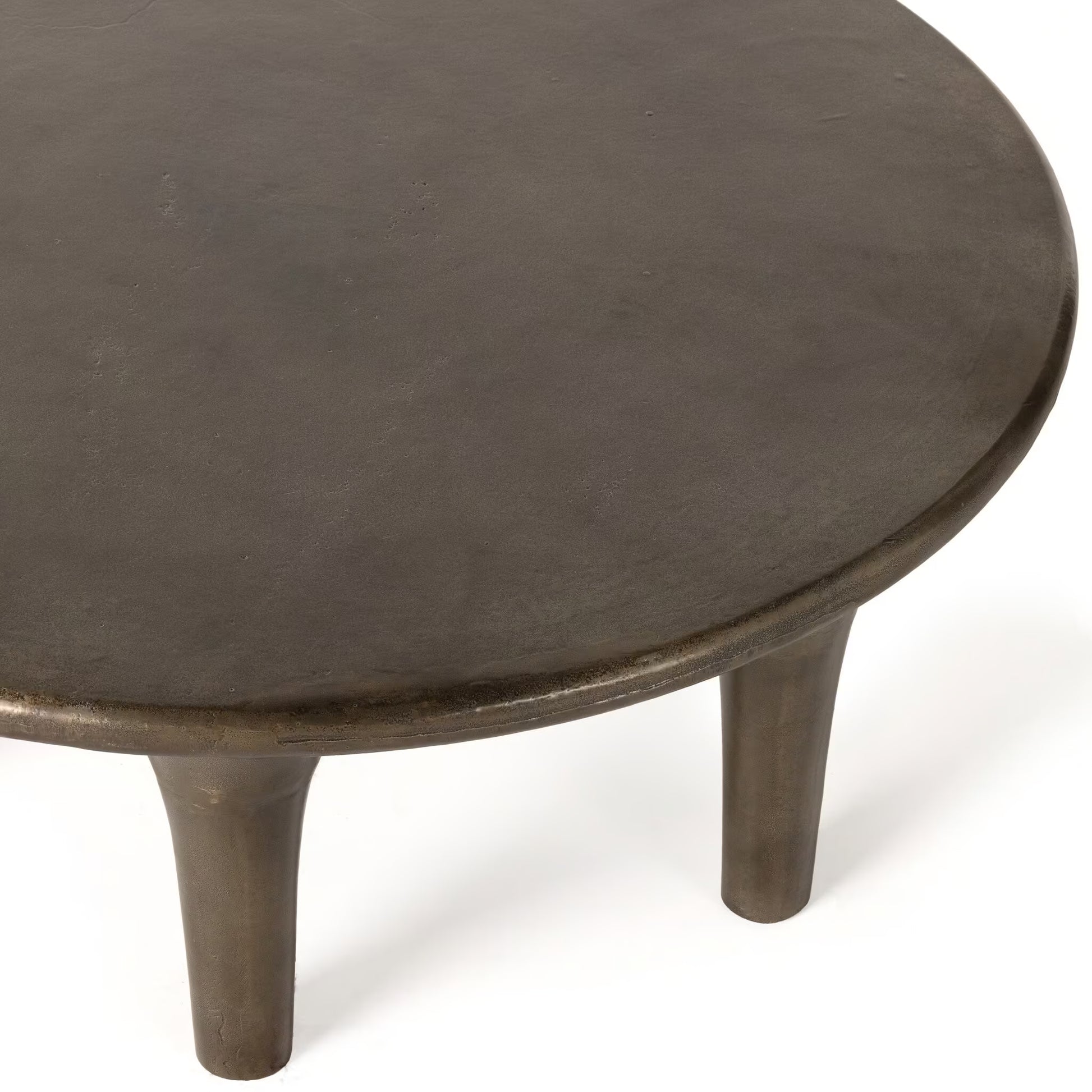 Round wooden table with four legs on a white background