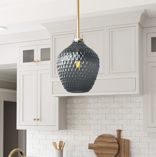 Lavine Handblown Glass Mini Pendant in smoked gray glass hanging in a kitchen