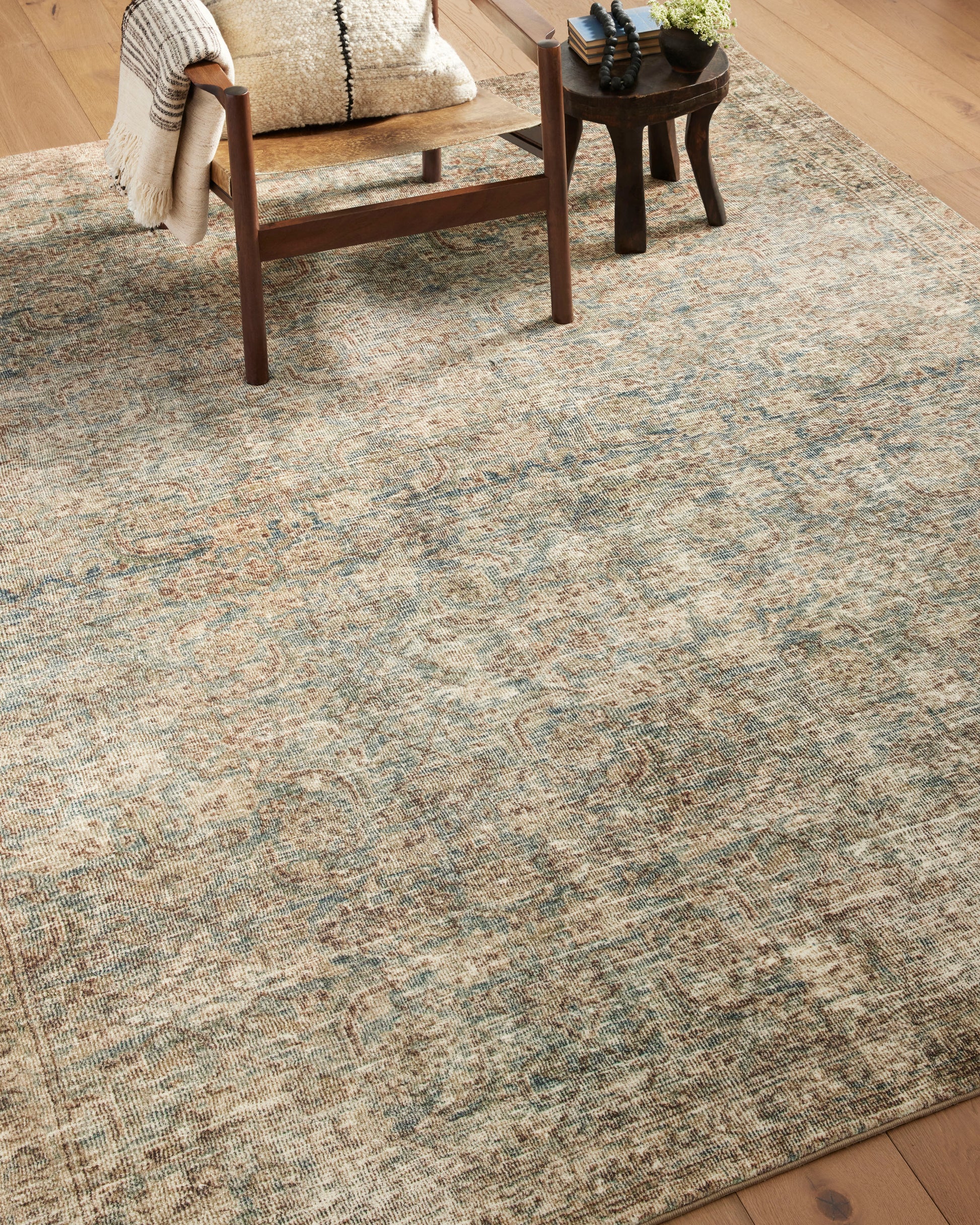 Morgan Sea/Sage area rug shown on wood floor
