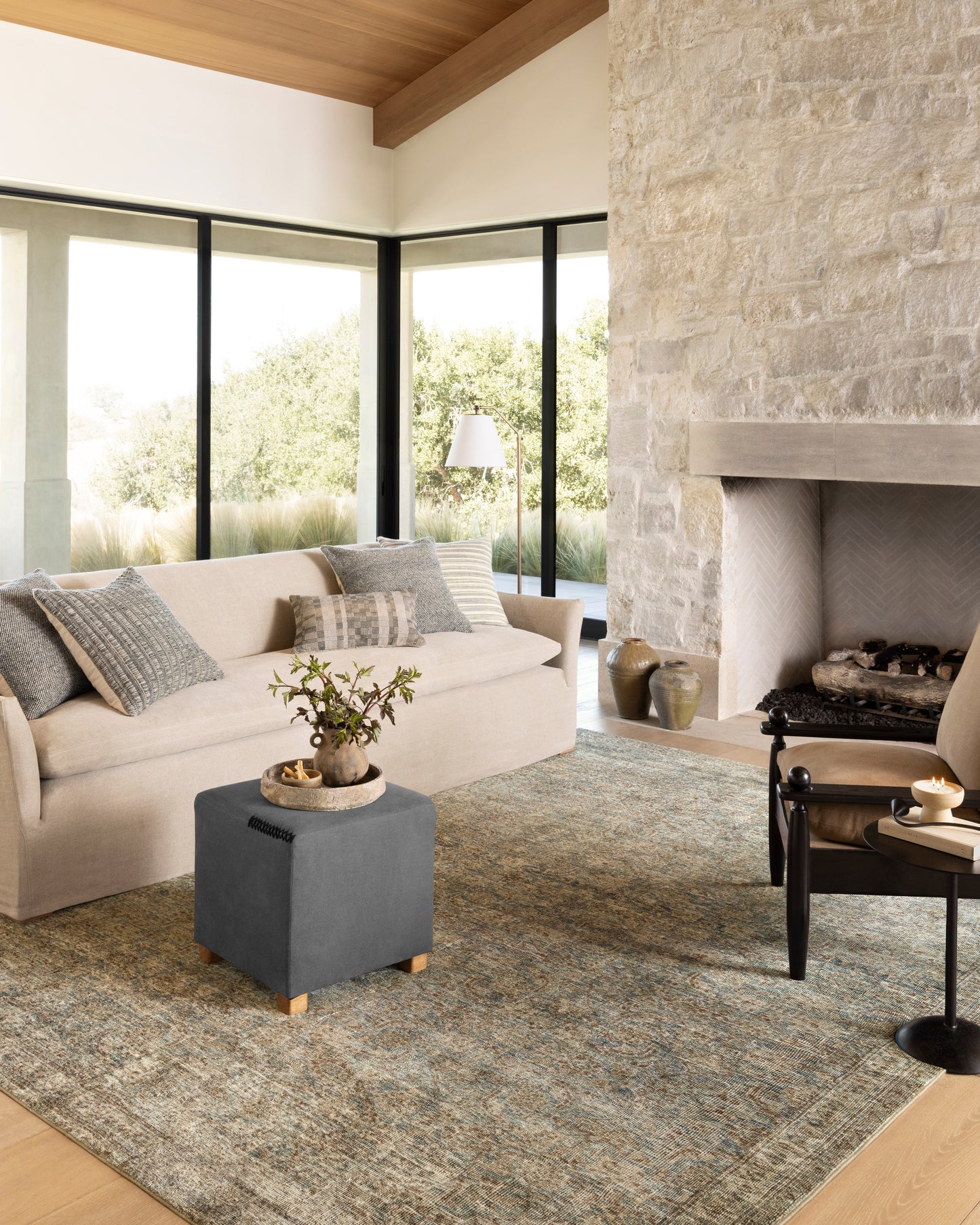 Morgan Sea/Sage area rug styled in a calm, layered room
