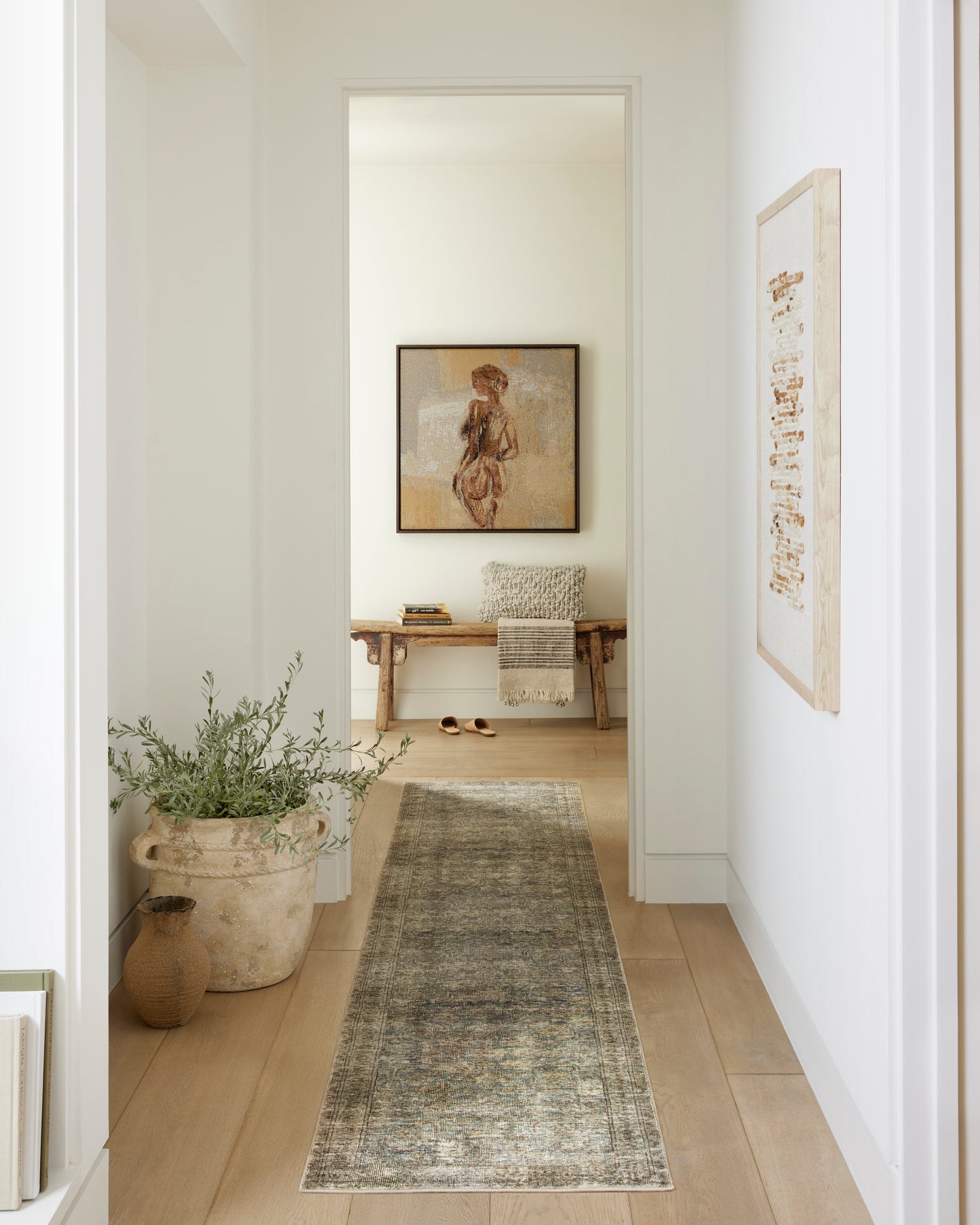 Morgan Sea/Sage area rug styled in a hallway