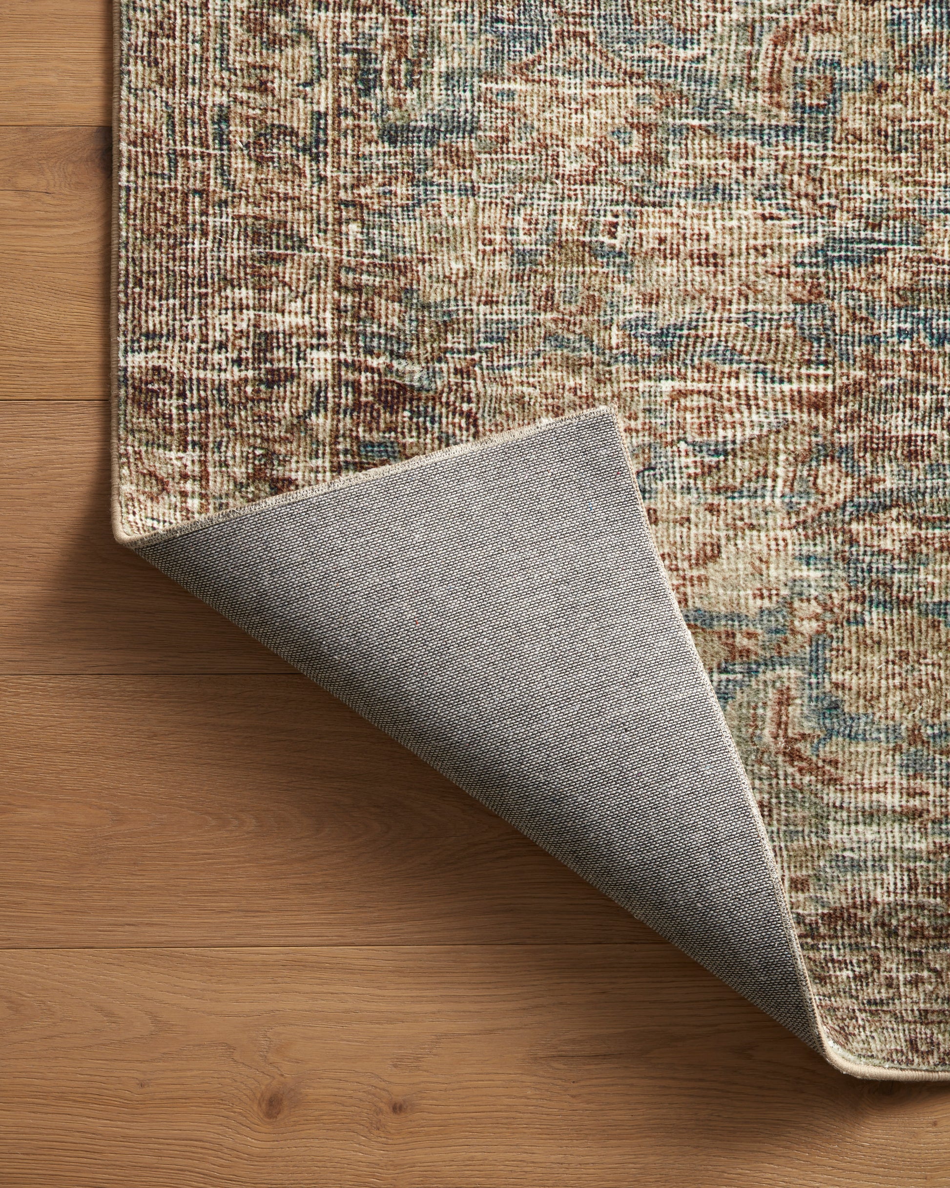 Morgan Sea/Sage rug showing soft sea and sage color variation on wood floor