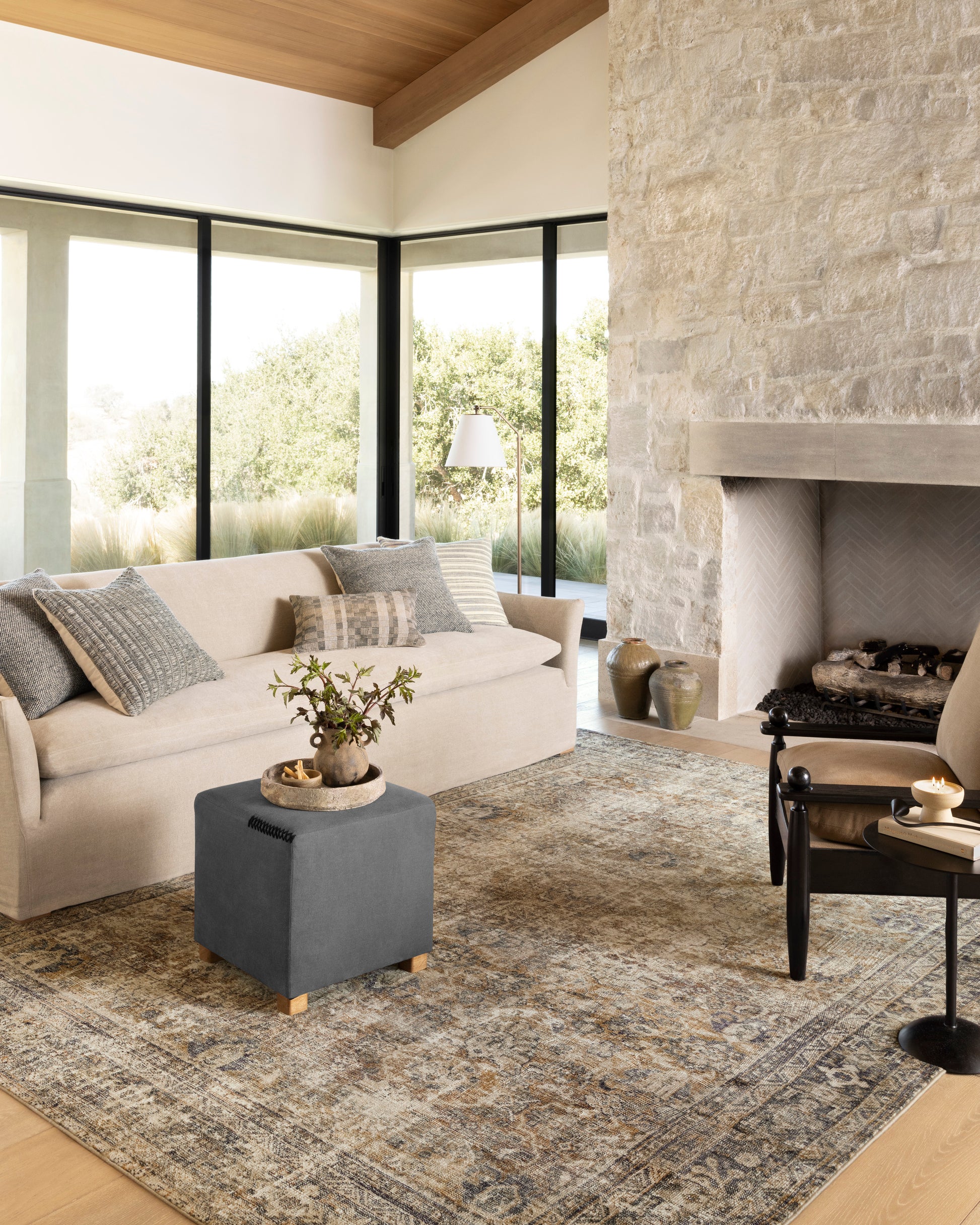 Morgan Sunset/Ink area rug styled in a warm living room
