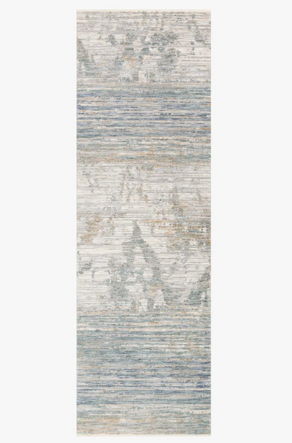 Ivory and blue patterned polyester rug with low pile