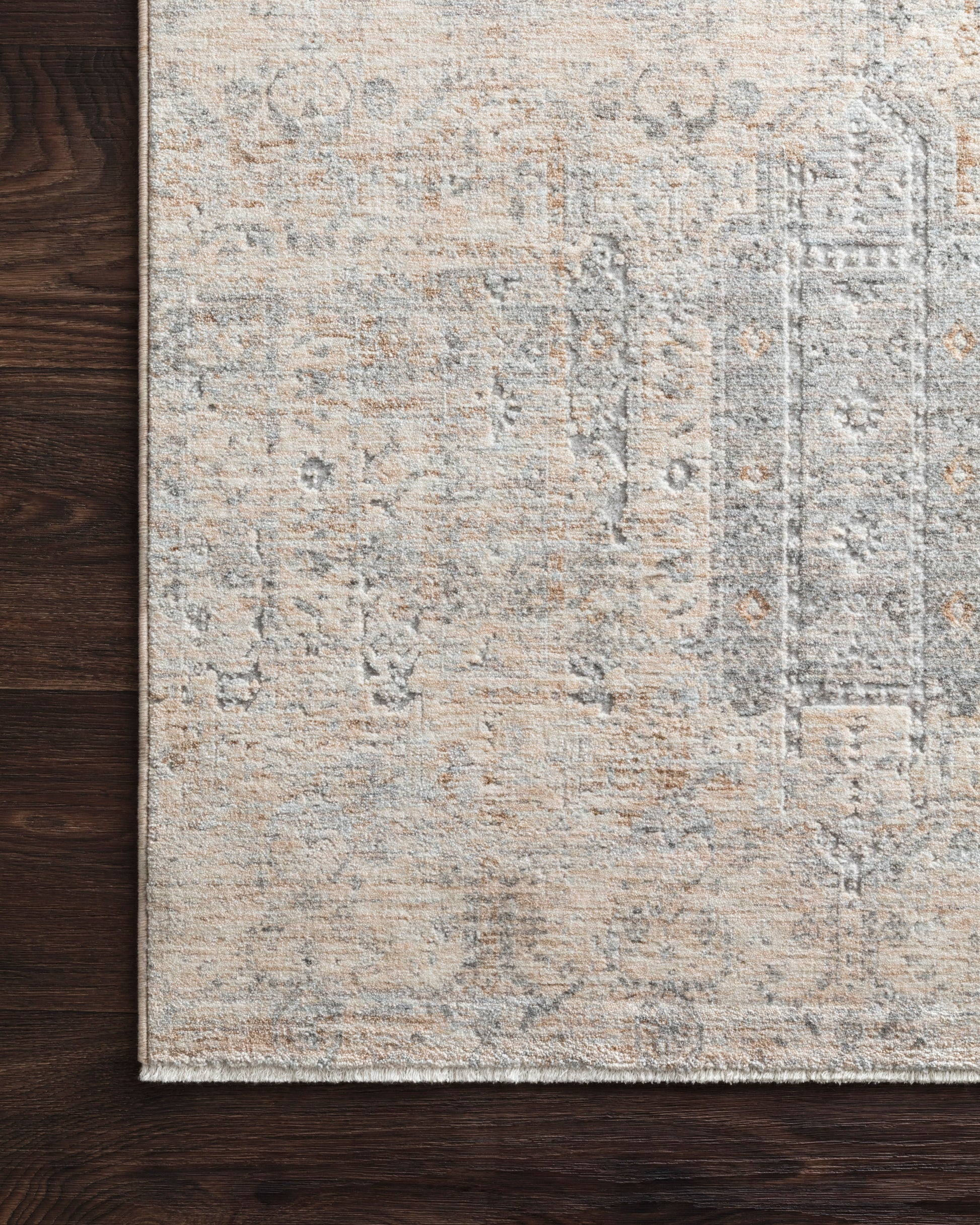 Pandora Ivory/Mist area rug styled in a refined living room